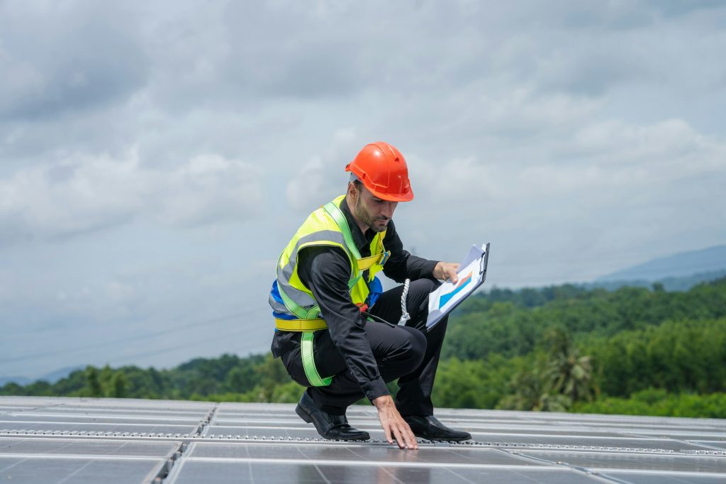 Technicians are checking solar panel,Engineer service check installation solar cell.